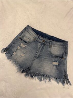Stretch Women’s Light Blue Distressed Denim Shorts with Frayed Hem